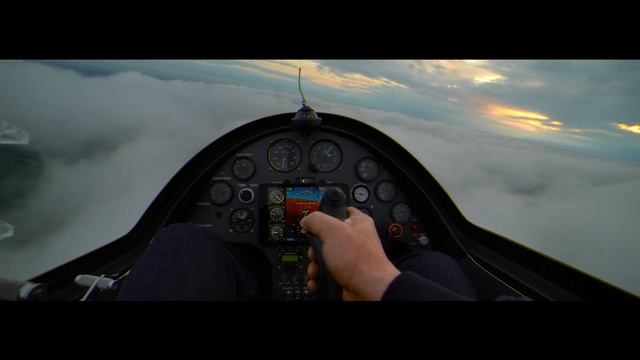 Video Reference: cockpit, air travel, sky, mode of transport, aviation, flight, screenshot, pilot, air sports, airplane, Person