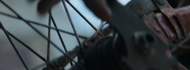 Video Reference: close up, spoke, wheel, metal, tire, sky, macro photography