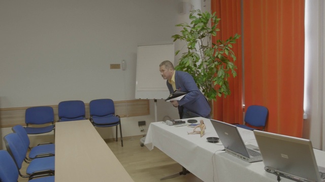 Video Reference: Office, Design, Room, Architecture, Table, Conference hall, Plant, Building, Interior design, Furniture