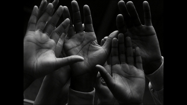 Video Reference: Hand, Black, Finger, Black-and-white, Nail, Monochrome photography, Monochrome, Gesture, Photography, Sign language, Person, Food, Holding, Black and white, Thumb, Wrist