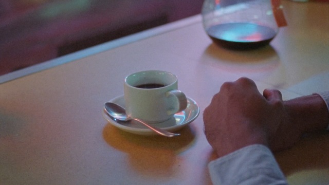 Video Reference: Cup, Cup, Coffee cup, Table, Drinkware, Hand, Drink, Serveware, Tableware, Turkish coffee