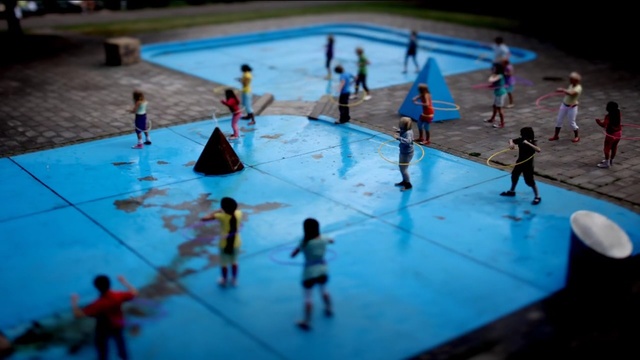 Video Reference: water, blue, sport venue, leisure, indoor games and sports, swimming pool, fun, recreation, leisure centre, competition, Person