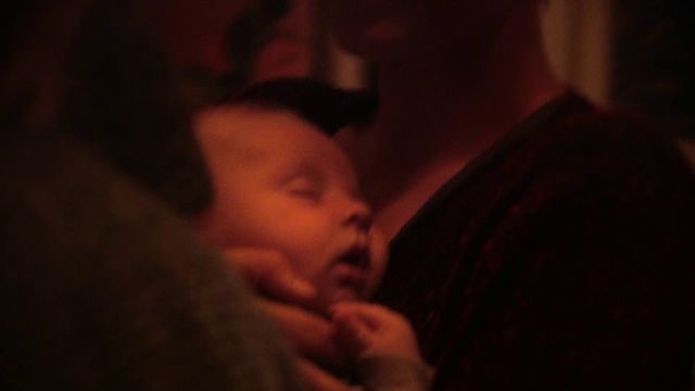 Video Reference: Black, Photograph, Face, Facial expression, Darkness, Nose, Child, Skin, Red, Head