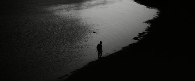 Video Reference: black, black and white, monochrome photography, water, atmosphere, sky, darkness, photography, light, monochrome, Person