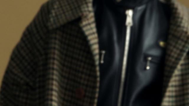 Video Reference: Black, Jacket, Leather, Clothing, Leather jacket, Zipper, Outerwear, Textile, Design, Pattern, Person