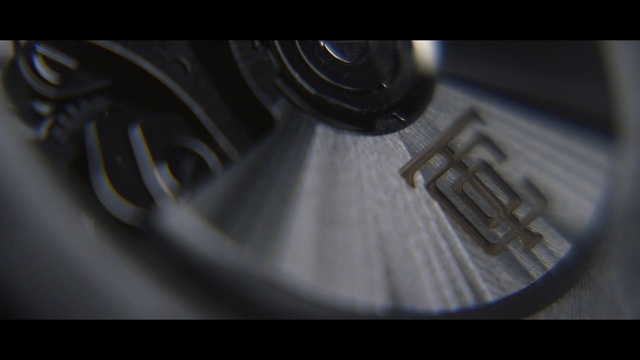 Video Reference: close up, photography, macro photography, light, automotive design, font, darkness, angle, wheel, computer wallpaper, Person