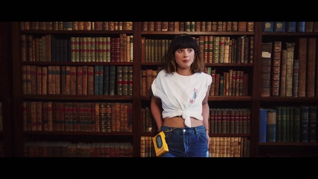 Video Reference: Library, Snapshot, Photography, Sitting, Book, Flash photography, Librarian, Person