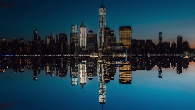 Video Reference: Reflection, City, Skyline, Blue, Water, Cityscape, Landmark, Human settlement, Daytime, Sky