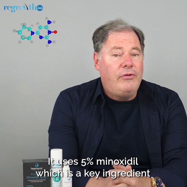 Video Reference: Forehead, Chin, Cheek, Photo caption, Media, Photography, Gesture, Person, Man, Indoor, Sitting, Front, Table, Holding, Computer, Laptop, Sign, Posing, Standing, Black, Smiling, Shirt, Phone, Wall, Screenshot, Human face, Text, Clothing, Male