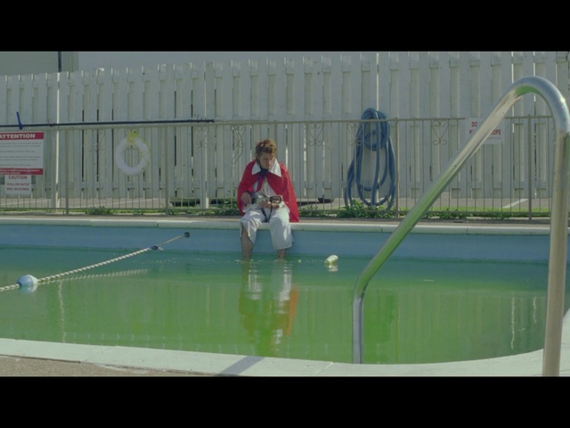 Video Reference: sport venue, water, leisure, player, green, games, fun, net, structure, tennis court, Person