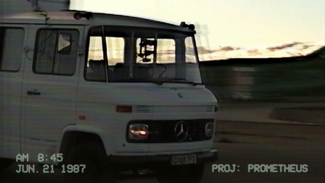 Video Reference: vehicle, motor vehicle, car, transport, commercial vehicle, mode of transport, van, recreational vehicle, family car, automotive exterior, Person