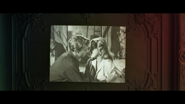 Video Reference: photograph, black, text, darkness, art, snapshot, screenshot, religion, black and white, picture frame