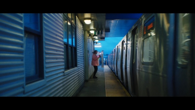 Video Reference: blue, transport, public transport, mode of transport, urban area, snapshot, rapid transit, darkness, metropolitan area, train