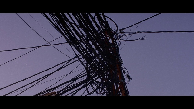 Video Reference: Sky, Overhead power line, Electricity, Wire, Line, Branch, Tree, Electrical supply, Atmosphere, Darkness