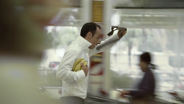 Video Reference: man, food, supermarket, run, motion, banana, window