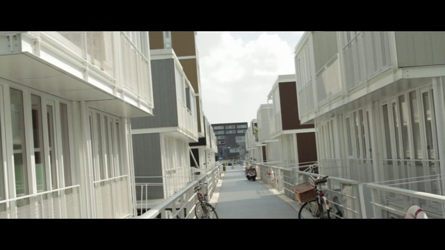 Video Reference: Architecture, Building, Snapshot, Neighbourhood, Metropolitan area, Urban area, Facade, Mixed-use, City, Real estate