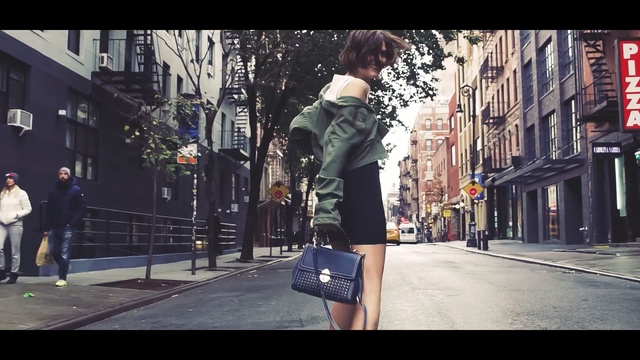 Video Reference: road, urban area, street, infrastructure, city, pedestrian, snapshot, photography, vehicle, girl