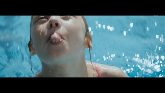Video Reference: Face, Water, Skin, Head, Beauty, Nose, Swimming pool, Fun, Eye, Underwater, Looking, Photo, Man, Sitting, Woman, Black, Monitor, Screen, Holding, White, Young, Red, Food, Blue, Television, Glass, Pink, Teeth, Room, Swimming, Human face, Person, Male
