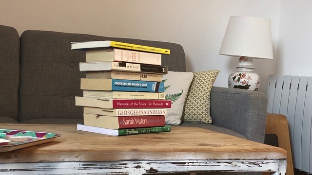 Video Reference: Shelf, Furniture, Shelving, Wall, Bookcase, Room, Table, Nightstand, Chest of drawers, Book