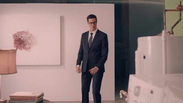 Video Reference: suit, formal wear, gentleman, standing, outerwear, tuxedo, white collar worker, Person