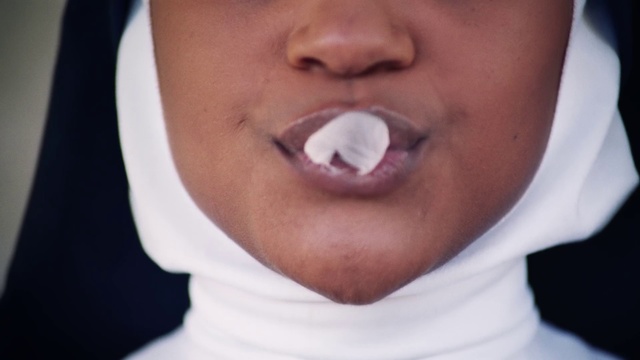 Video Reference: Lip, Mouth, Tooth, Nose, Chin, Tongue, Organ, Neck, Cheek, Jaw, Person, Clothing, Man, Necktie, Indoor, Wearing, Looking, Shirt, White, Dress, Glasses, Hair, Dressed, Close, Black, Suit, Young, Wedding, Face, Head, Bow, Blue, Eyes, Holding, Red, Standing, Teeth, Brushing, Human face, Baby, Eyebrow, Skin, Toddler, Staring