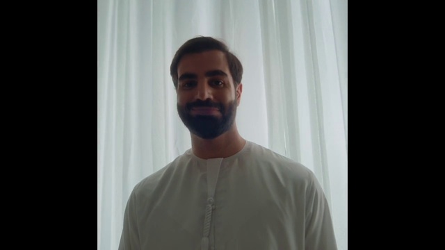 Video Reference: Forehead, Beard, Jaw, Sleeve, Curtain, Eyelash, Facial hair, T-shirt, Moustache, Smile