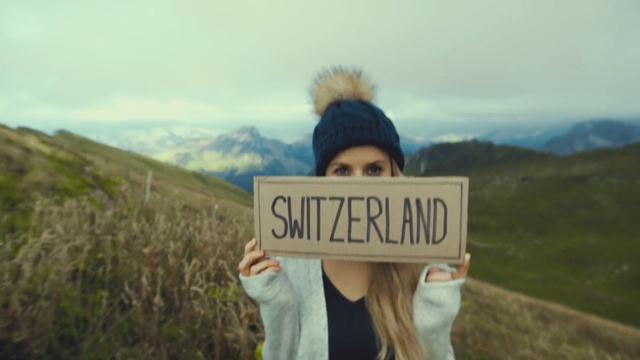 Video Reference: nature, mountainous landforms, sky, mountain, grass, tree, photography, girl, hill, vacation, Person