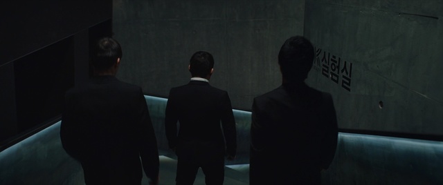 Video Reference: Darkness, Screenshot, Adaptation, Room, Photography, Shadow, Midnight, Space, Suit, Conversation, Person