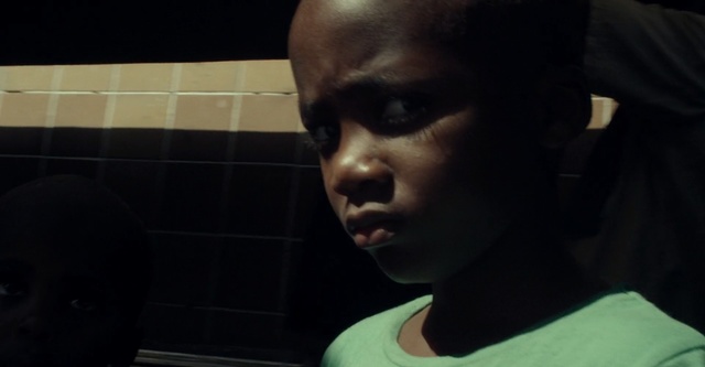 Video Reference: Face, Hair, Black, Head, Nose, Eyebrow, Cheek, Forehead, Chin, Child