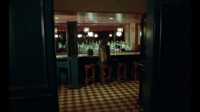 Video Reference: Restaurant, Room, Building, Table, Night, Glass, Indoor, Cabinet, Window, Refrigerator, Kitchen, Sitting, Door, Dark, Living, Standing, Large, White, Mirror, Red, Oven, Fire, Furniture, Floor, Bar, Chair, Kitchen & dining room table, Menu, Dining table