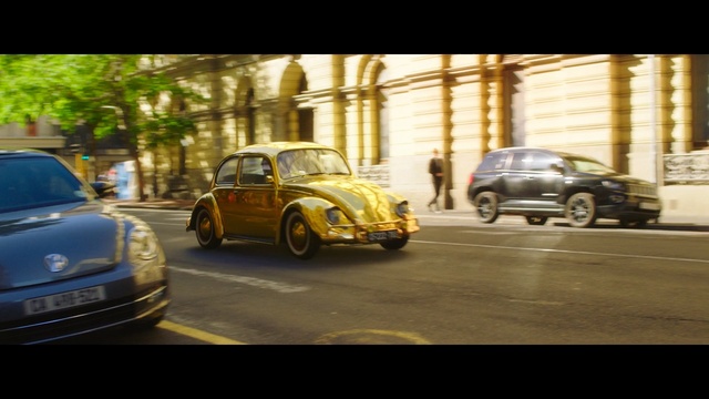 Video Reference: car, motor vehicle, vehicle, vintage car, mode of transport, automotive design, volkswagen beetle, snapshot, classic, road, Person