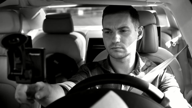 Video Reference: car, motor vehicle, vehicle, automotive design, photography, black and white, technology, monochrome, driving, muscle, Person