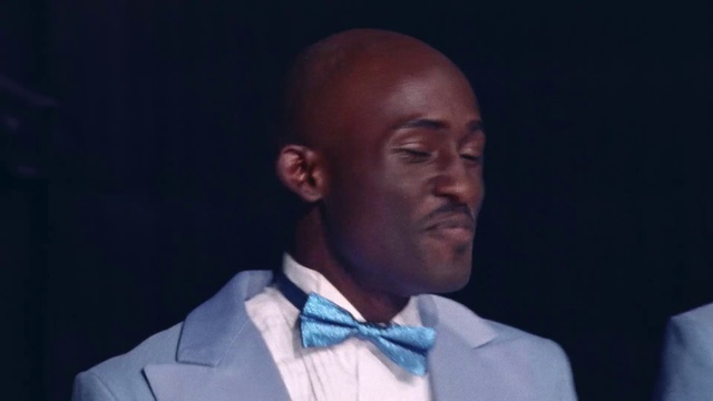 Video Reference: Tie, Bow tie, Chin, Forehead, Head, Cheek, Formal wear, Human, Suit, Neck