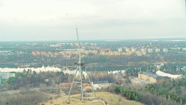 Video Reference: Aerial photography, Atmospheric phenomenon, Urban area, Metropolitan area, Sky, City, Tower, Photography, Technology, Antenna