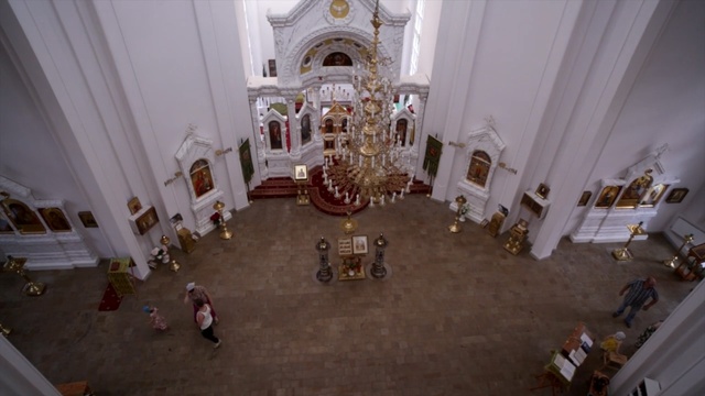 Video Reference: Religious institute, Room, Building, Convent, Chapel, Interior design, Furniture, Floor, Altar, Flooring, Person