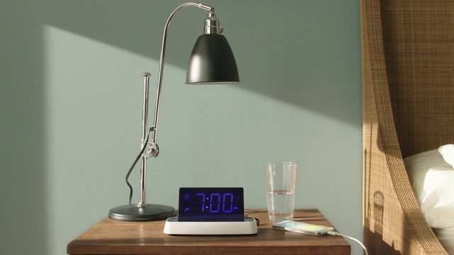 Video Reference: Blue, Lamp, Light fixture, Lighting, Table, Room, Lighting accessory, Furniture, Lampshade, Design, Person