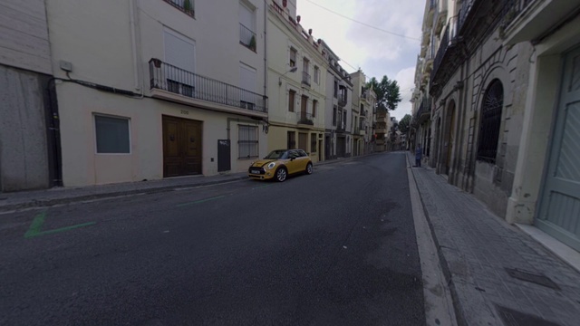 Video Reference: Road, Street, Neighbourhood, Town, Asphalt, Mode of transport, Yellow, Residential area, Infrastructure, Lane