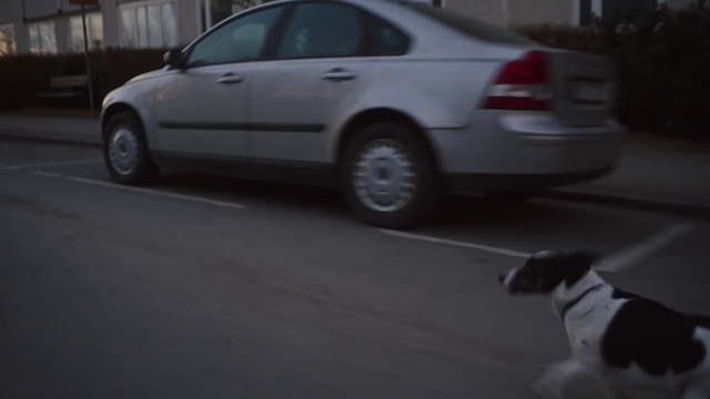 Video Reference: Land vehicle, Vehicle, Car, Public space, Mid-size car, Parking, Luxury vehicle, Photography, Road, Compact car, Person