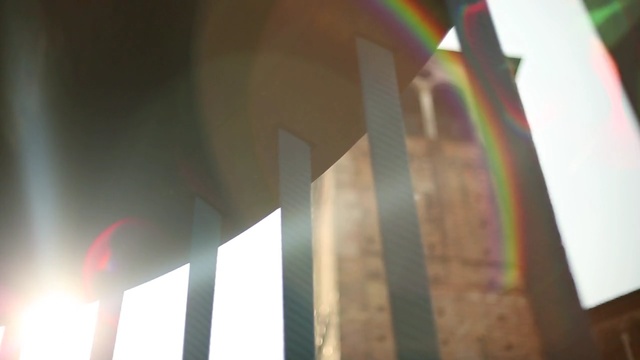 Video Reference: Light, Architecture, Line, Yellow, Sky, Sunlight, Material property, Tree, Lens flare, Column, Person