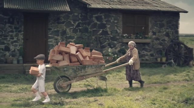 Video Reference: Vehicle, Cart, Wheelbarrow, Mode of transport, Grass, Wagon, Plant, Person