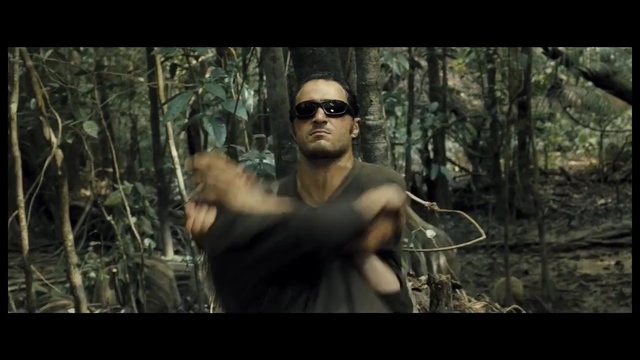 Video Reference: Jungle, Natural environment, Forest, Movie, Eyewear, Woodland, Tree, Music, Muscle, Photography, Person