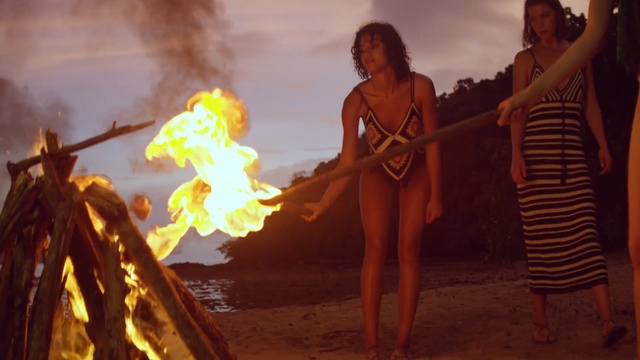 Video Reference: fire, flame, sunlight, screenshot, girl, fun, evening, computer wallpaper, heat, ritual, Person