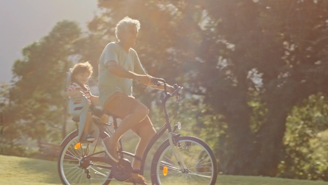 Video Reference: land vehicle, bicycle, road bicycle, yellow, cycling, vehicle, snapshot, sports equipment, bicycle accessory, mountain bike, Person