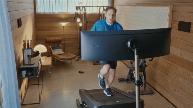 Video Reference: Exercise machine, Treadmill, Exercise equipment, Standing, Desk, Furniture, Room, Table, Physical fitness, Person