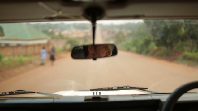 Video Reference: car, land vehicle, vehicle, motor vehicle, mode of transport, glass, automotive mirror, road, windshield, family car