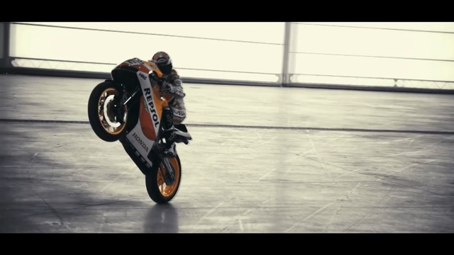 Video Reference: Stunt performer, Motorcycle, Wheelie, Stunt, Vehicle, Motorcycling, Motorsport, Motorcycle racing, Extreme sport, Racing, Person