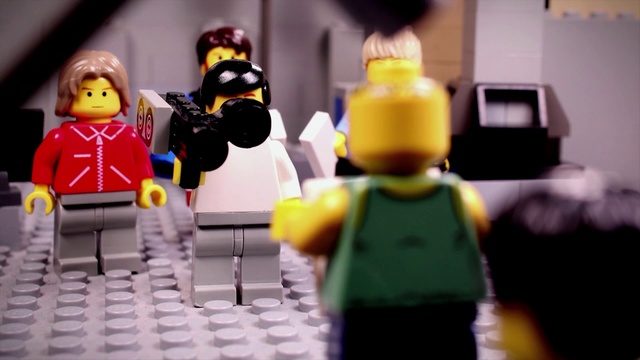 Video Reference: Toy, Yellow, Lego, Toy block, Action figure, Fictional character, Figurine, Play