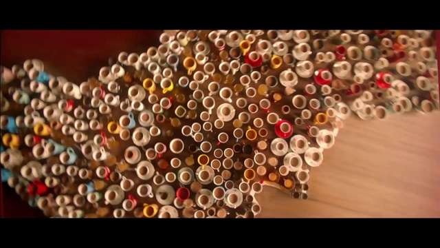Video Reference: Bead, Fashion accessory, Jewellery, Art, Necklace, Bracelet, Photo, Colorful, Table, Red, View, Large, Computer, Different, Light, Standing, Man, Room, Board, Display, Abstract, Circle, Colored