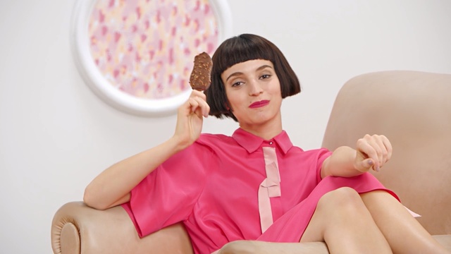 Video Reference: Skin, Pink, Beauty, Cheek, Lip, Shoulder, Ear, Sitting, Neck, Leg, Person