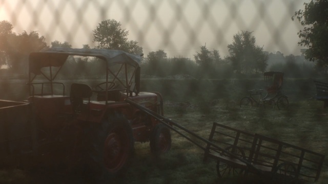 Video Reference: Atmospheric phenomenon, Mode of transport, Vehicle, Field, Morning, Rural area, Atmosphere, Farm, Grass, Tree